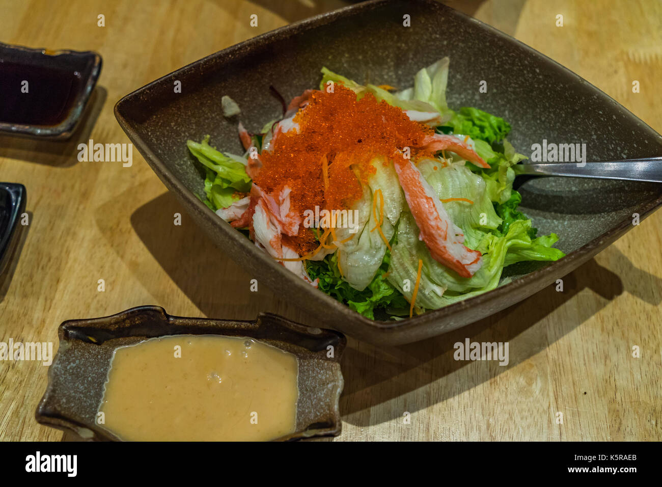 Japanese salad with carrot, iceberg lettuce,cucumber and crab stick