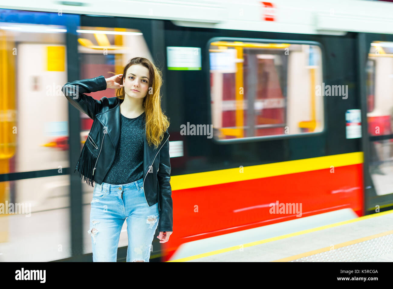 The girl near subway train Stock Photo - Alamy