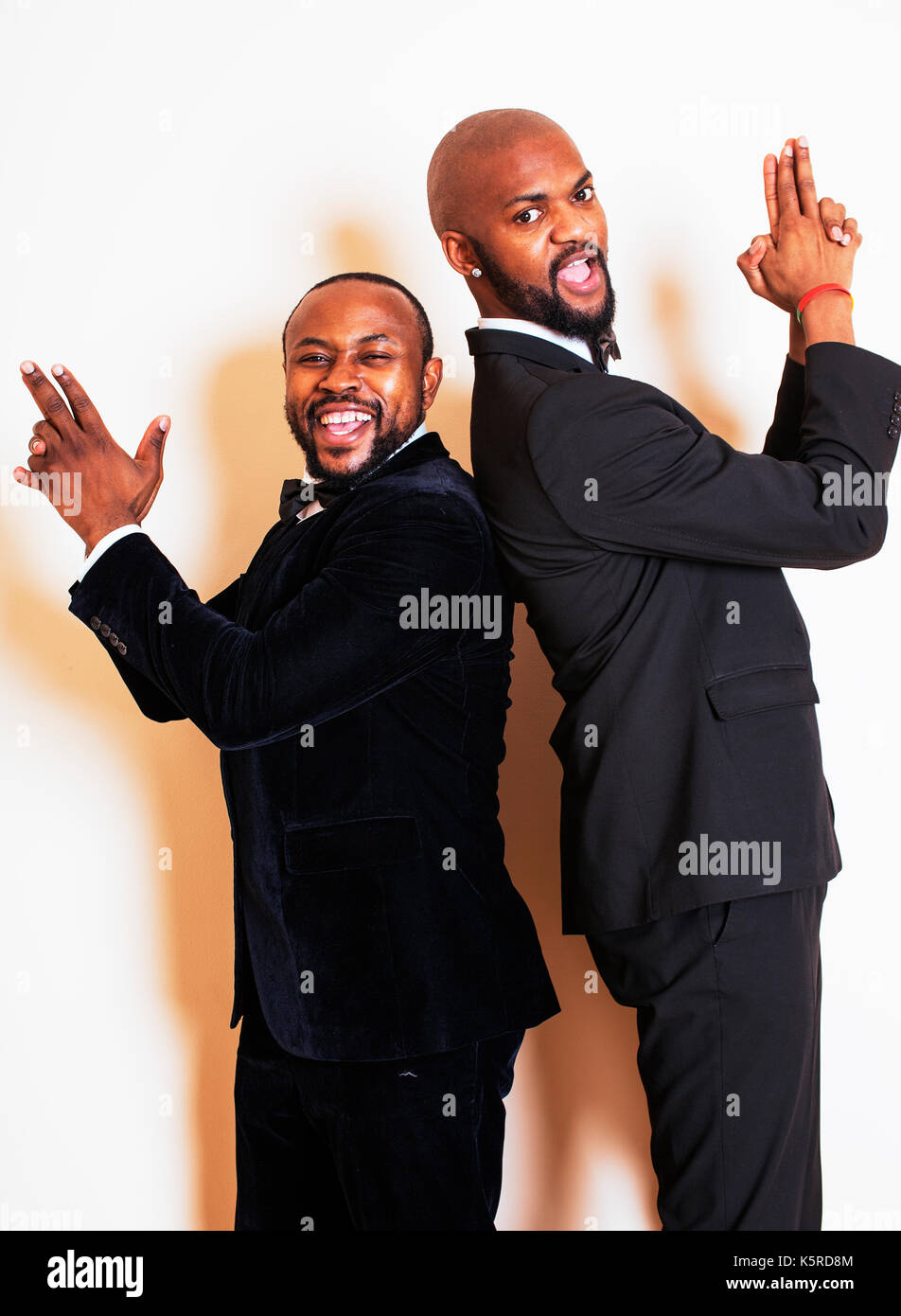 two afro-american businessmen in black suits emotional posing, g Stock ...