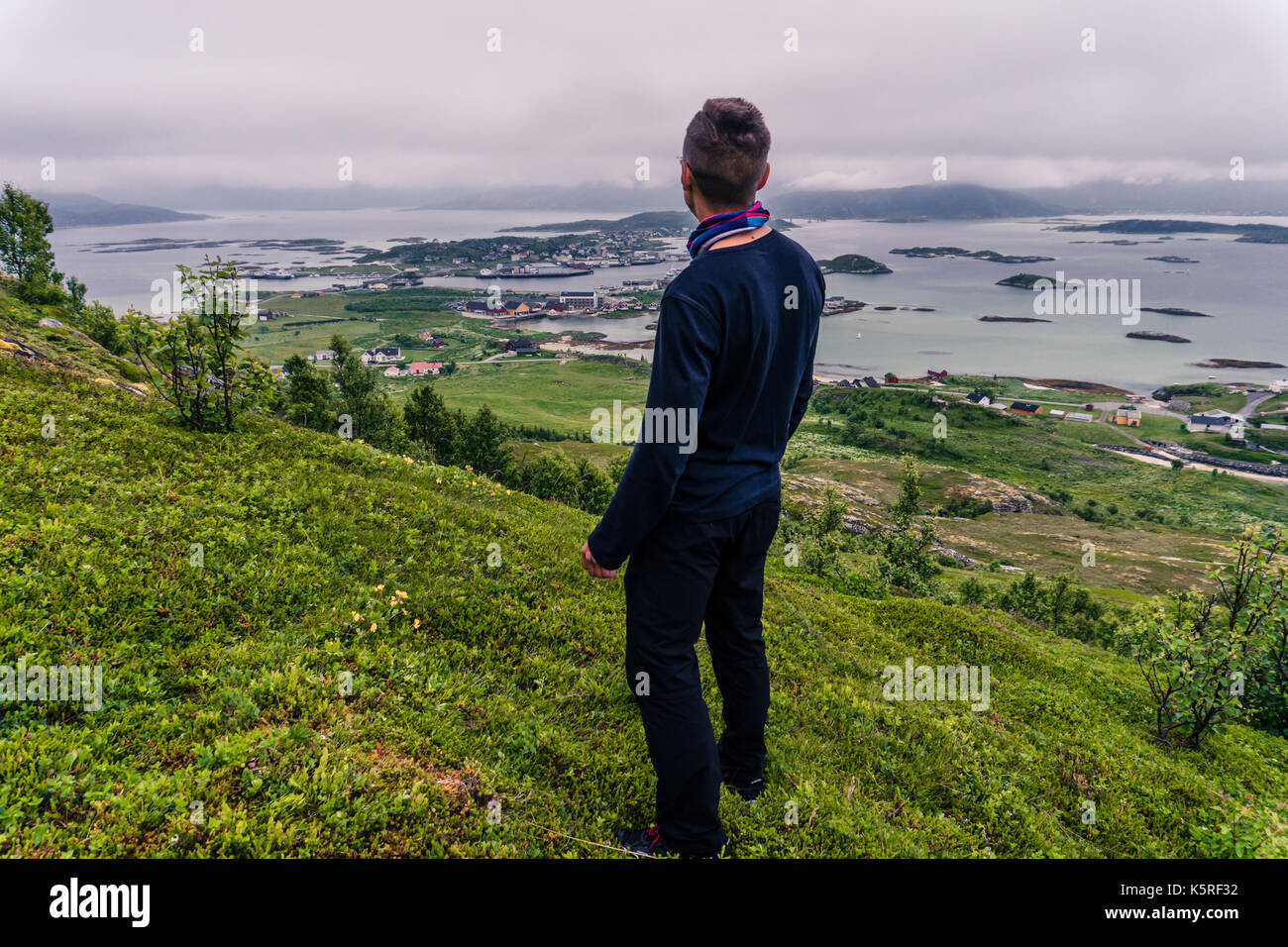 A man watching a landscape of village in Norway, Scandinavia Stock Photo