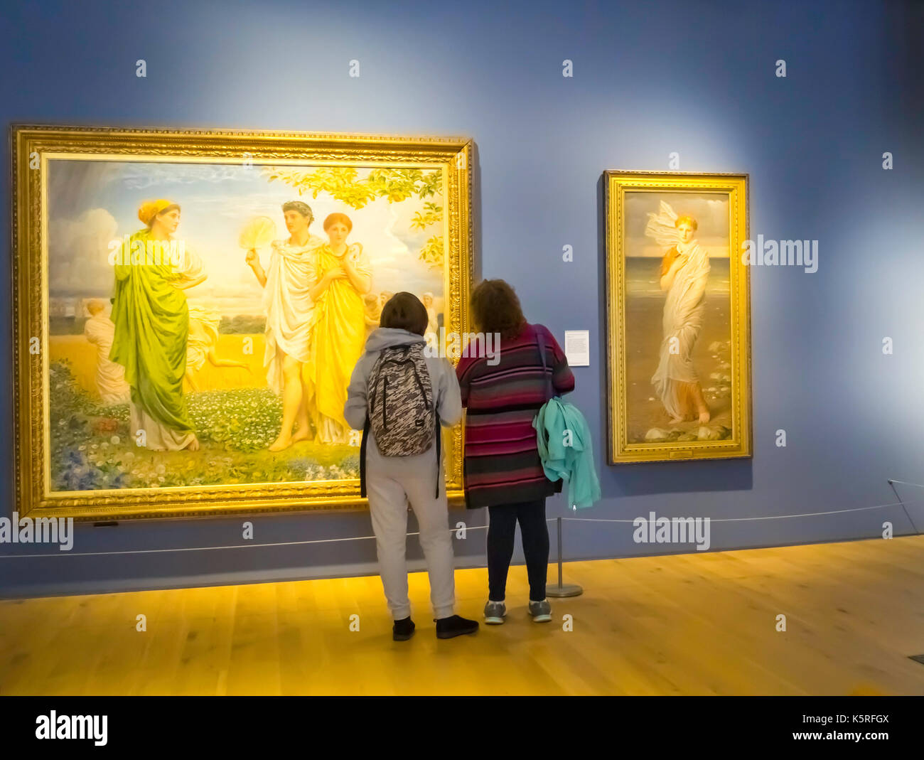 York Art Gallery interior with two lady visitors viewing paintings by