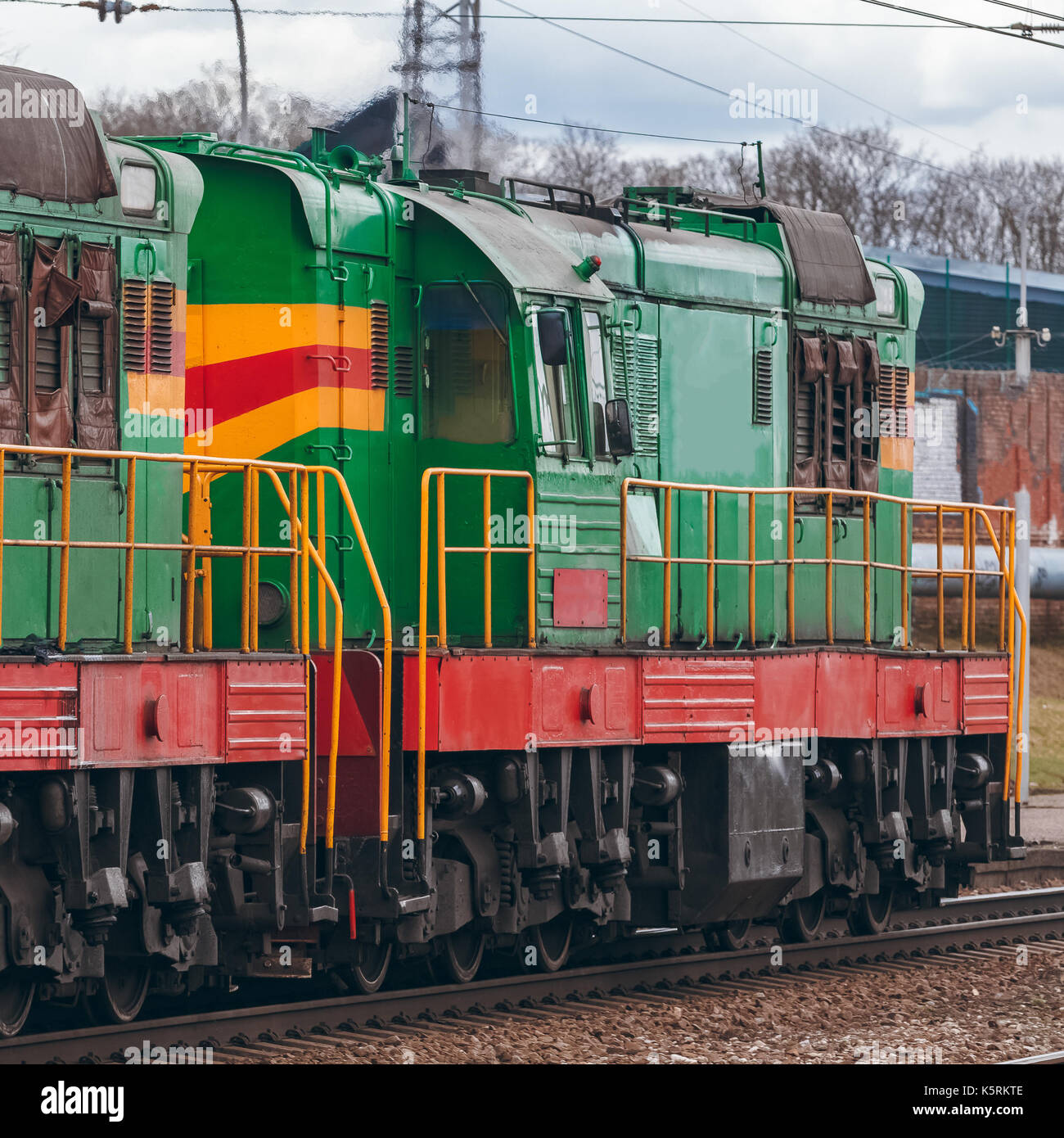 Green diesel cargo Freight train in action Stock Photo Alamy