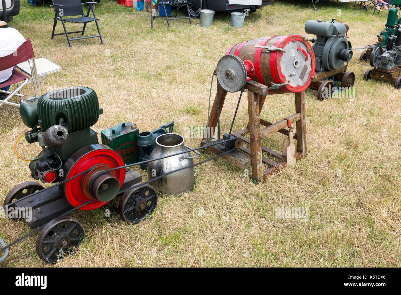 An early mechanised butter churn at the Sedgemoor Vintage Rally, Pawlett Somerset, England, UK Stock Photo