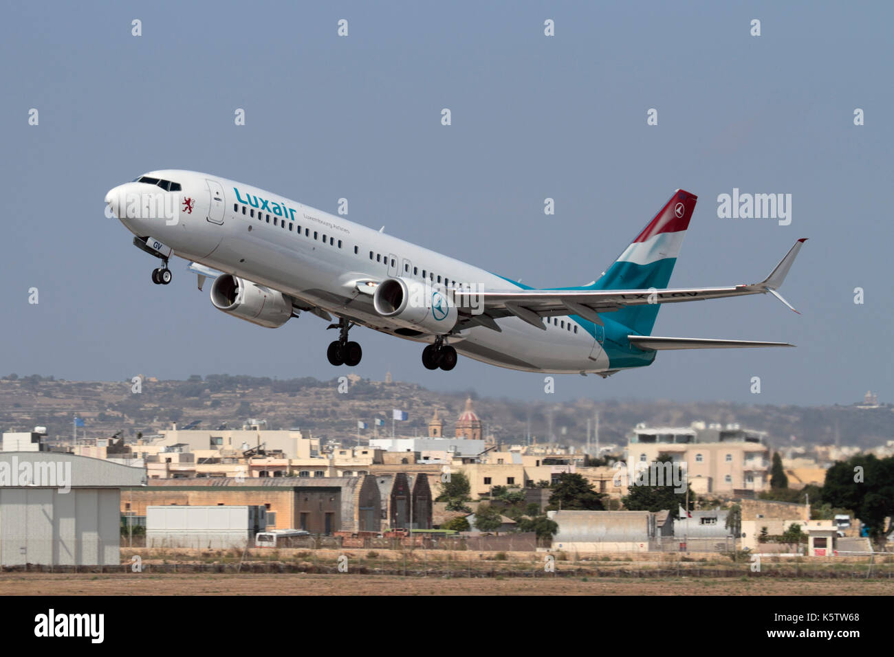 Civil aviation in the EU. Luxair Luxembourg Airlines Boeing 737-800 jet plane taking off from Malta Stock Photo