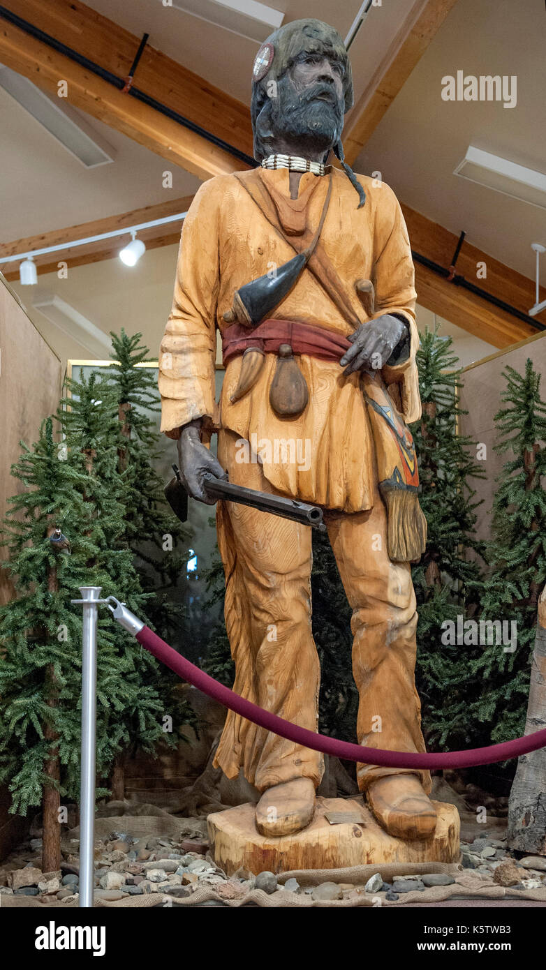 Wooden sculpture of a fur trapper in the Museum of the Mountain Man in Pinedale, Wyoming Stock Photo