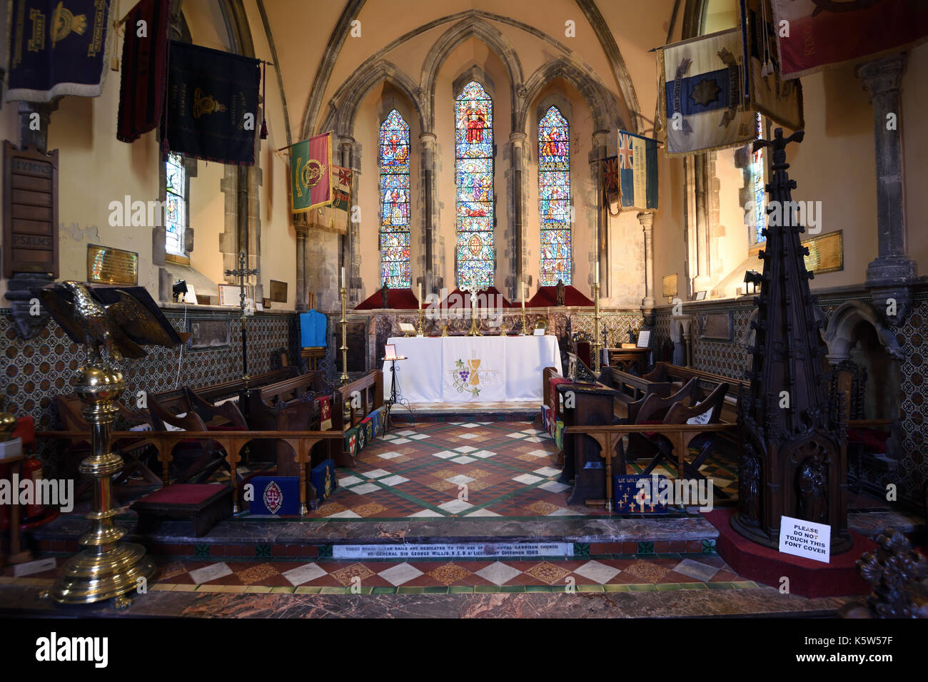 The Victorian interior of the chancel of The Royal Garrison Church. Portsmouth, Hampshire, UK. Stock Photo