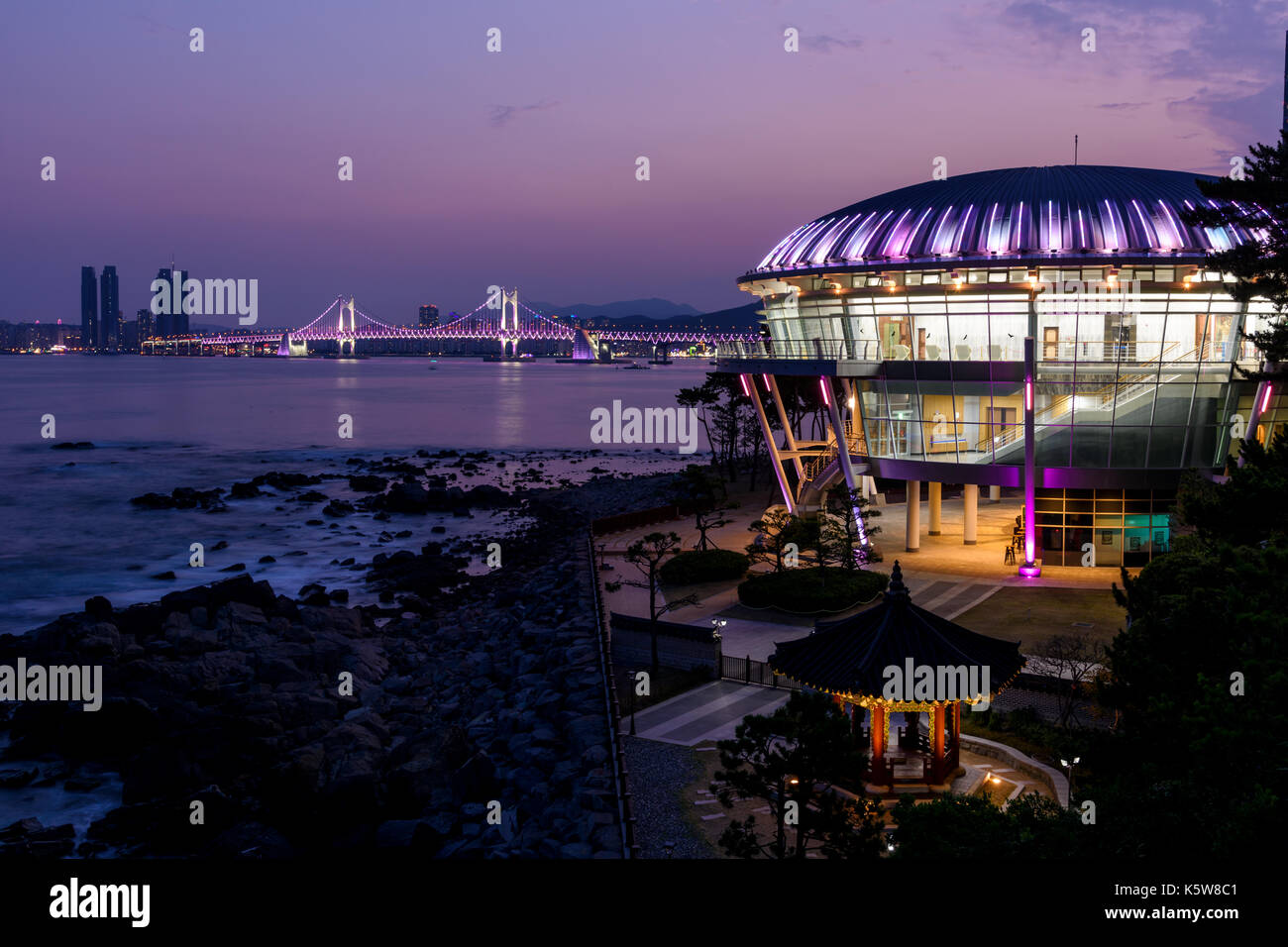 Night view of Gwangan Bridge and Nurimaru APEC House at  Dongbaek island. Stock Photo