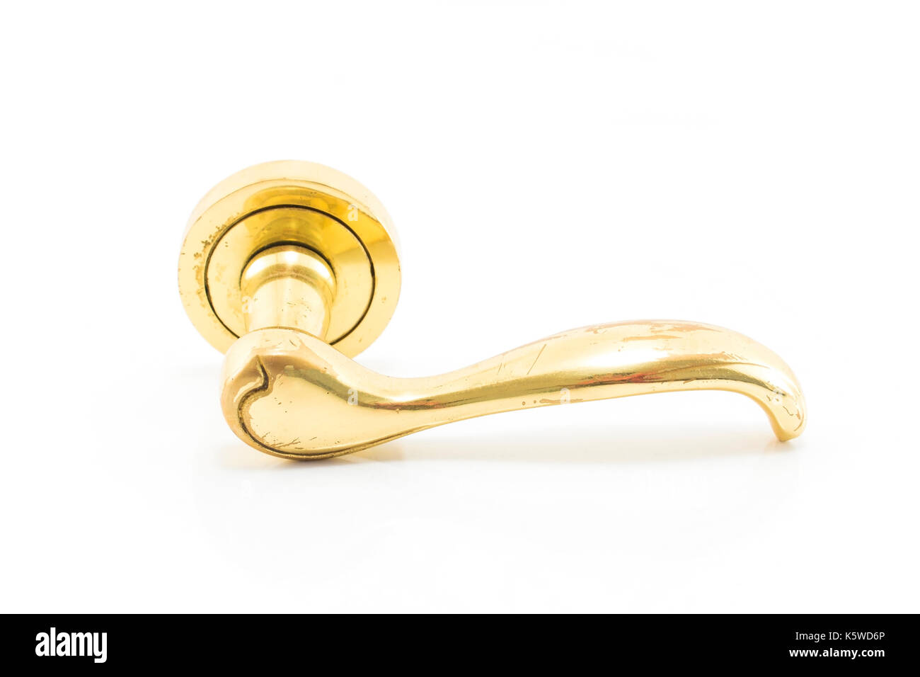 Old Gold Door Handle Isolated on White. Stock Photo