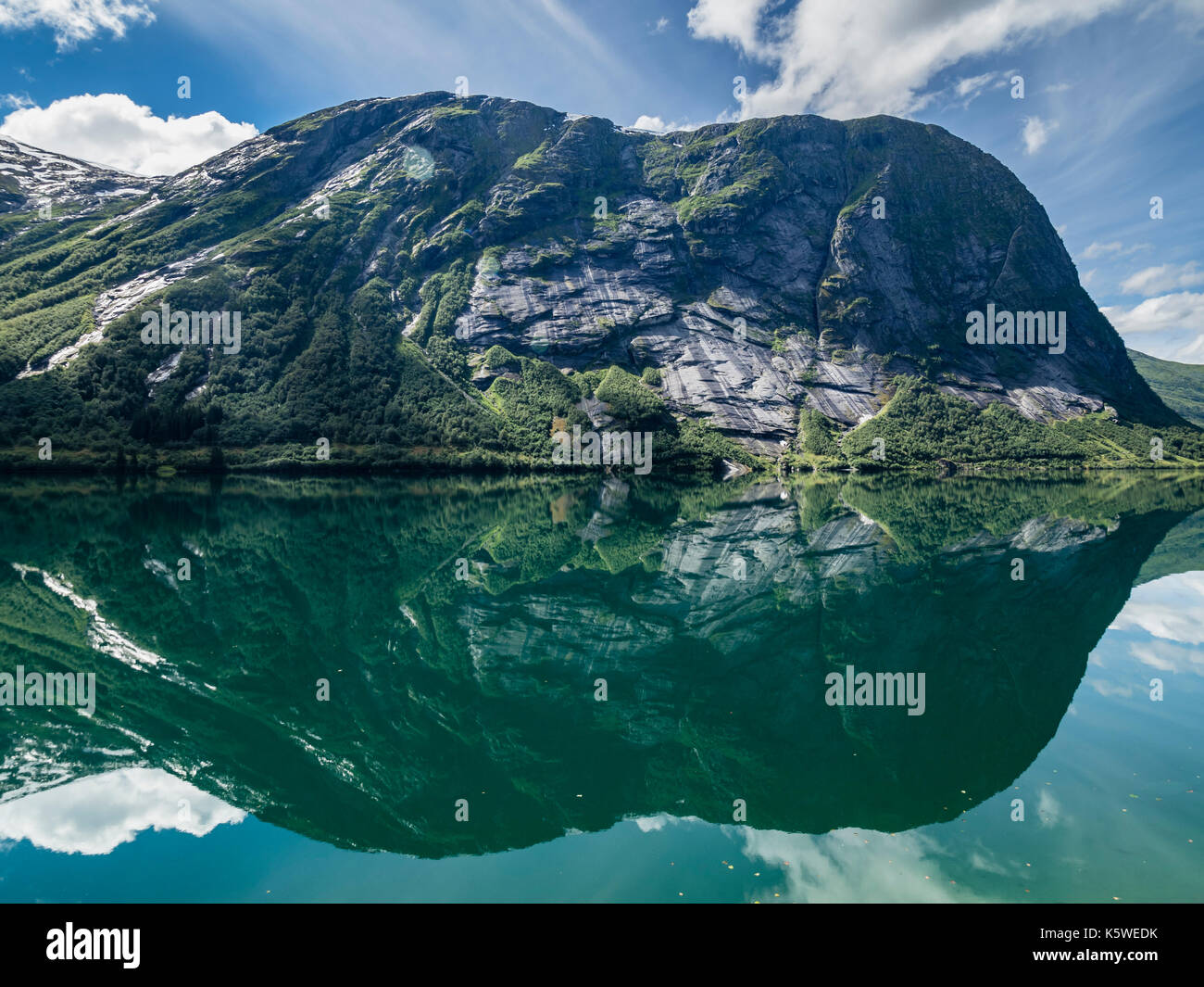 Mountain reflections in the Kjösnesfjord south of Byrkjelo,  Fjord region, Norway Stock Photo