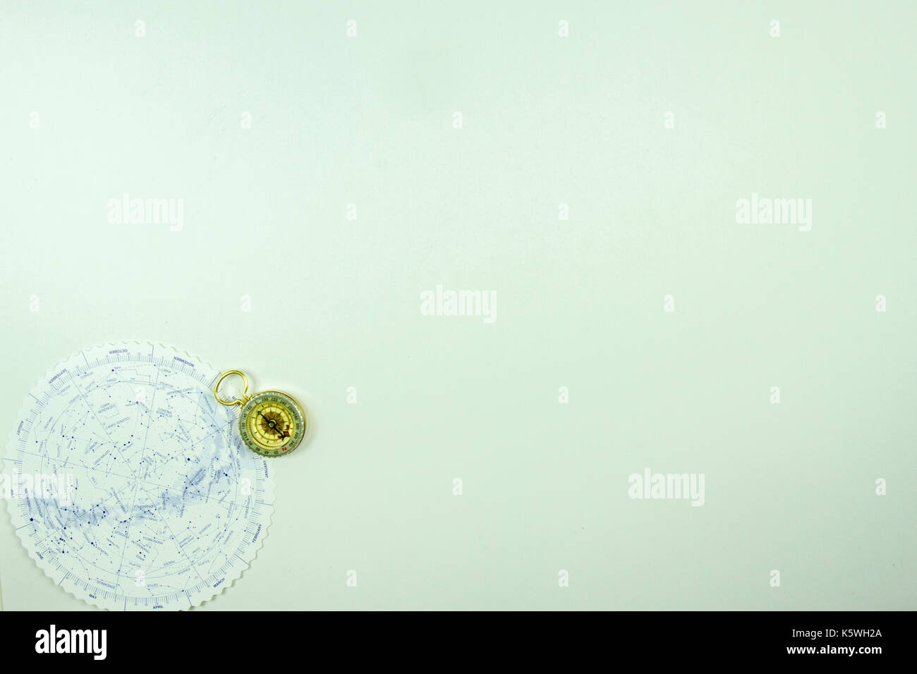 Constellation chart with compass on white with copy space Stock Photo