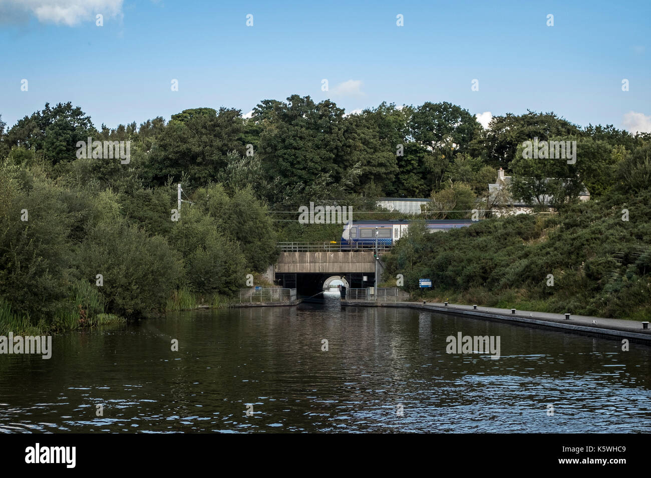 Turnaround point for the gondola on the Falkirk Wheel boat trip - view of the train bridge, the tunnel and the rings of the Falkirk Wheel in Scotland Stock Photo