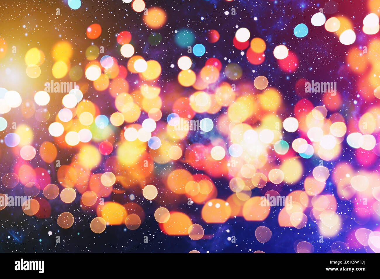 Festive background with natural bokeh and bright golden lights. Vintage Magic background with colorful bokeh. Spring Summer Christmas New Year disco p Stock Photo