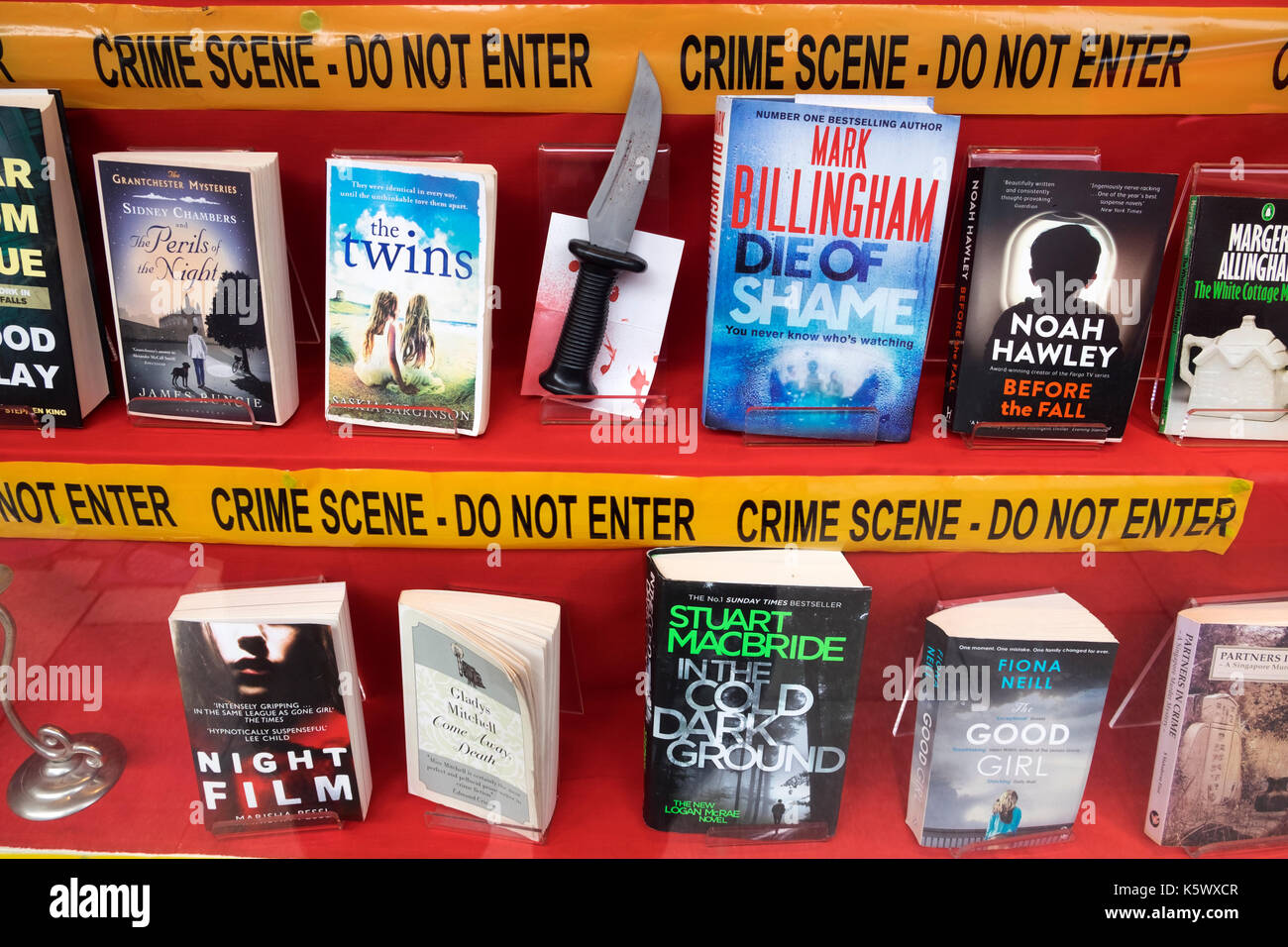 Secondhand crime novels, Oxfam book shop, Woodbridge, Suffolk, England. Stock Photo