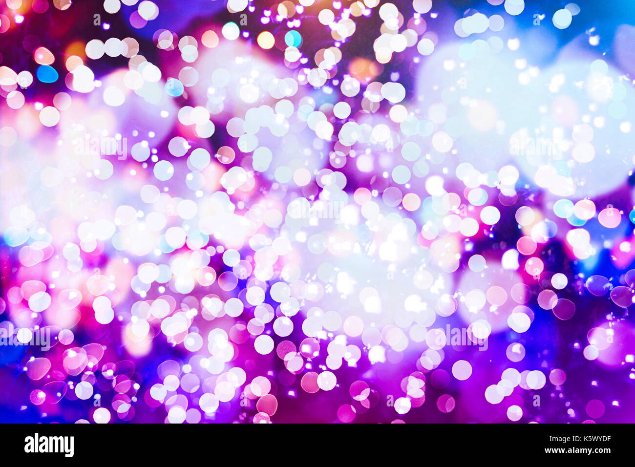 Festive background with natural bokeh and bright golden lights. Vintage Magic background with colorful bokeh. Spring Summer Christmas New Year disco p Stock Photo