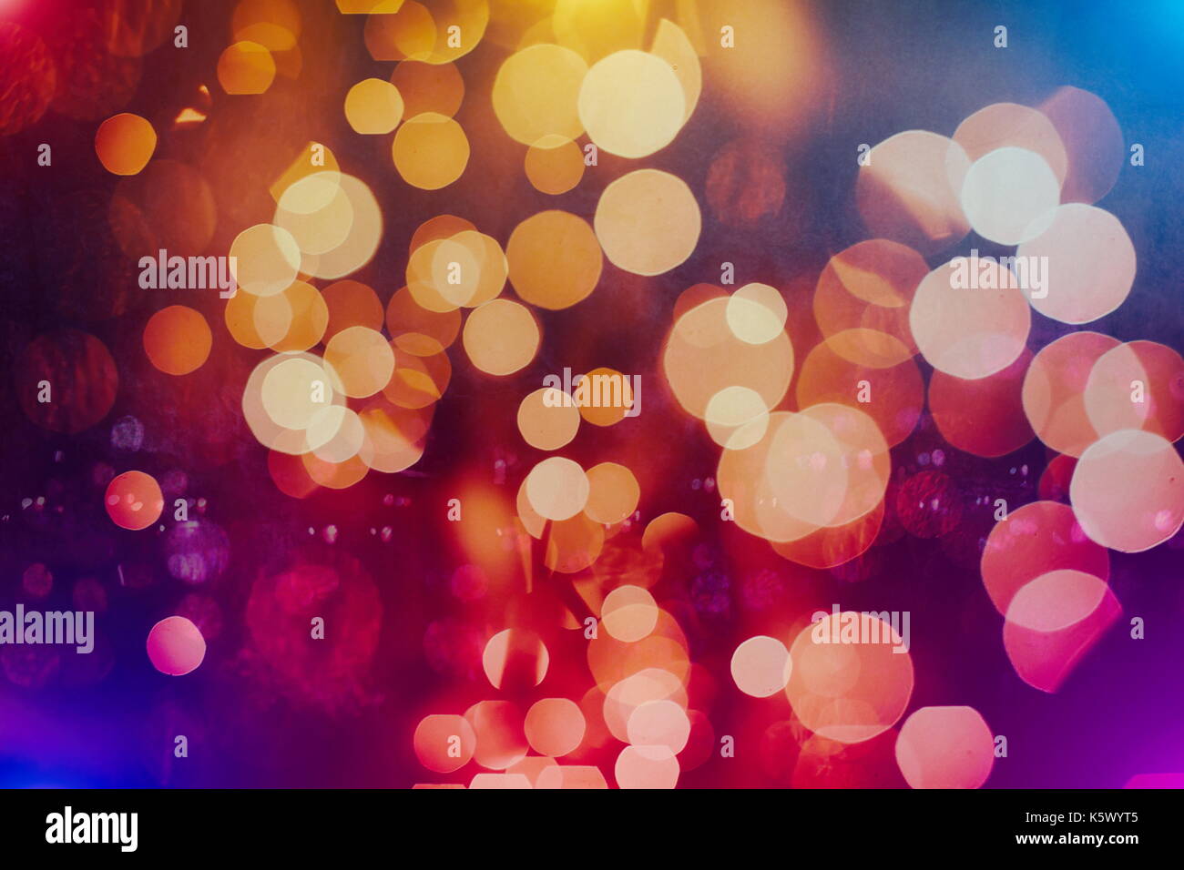 Festive background with natural bokeh and bright golden lights. Vintage ...