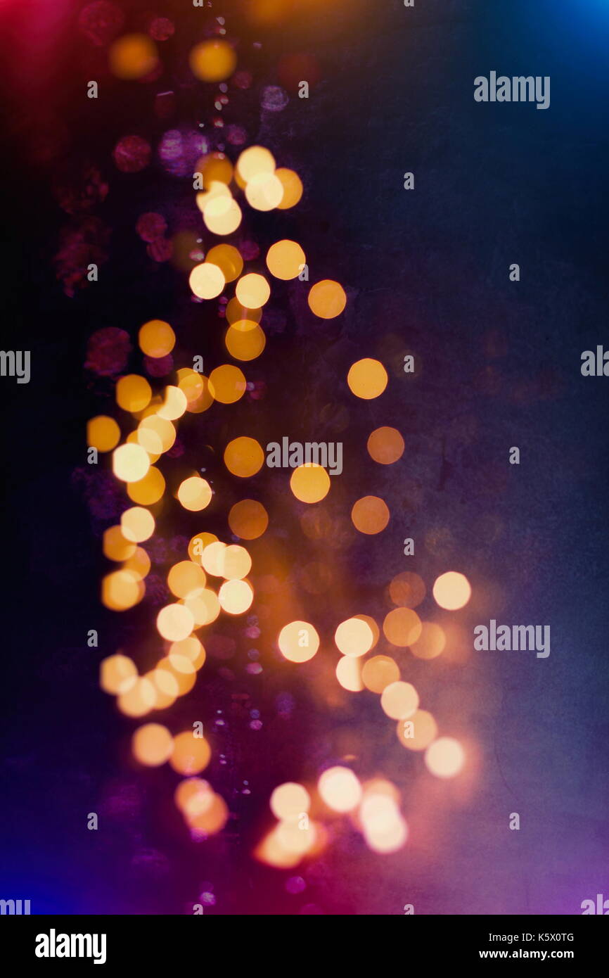 Festive background with natural bokeh and bright golden lights. Vintage ...