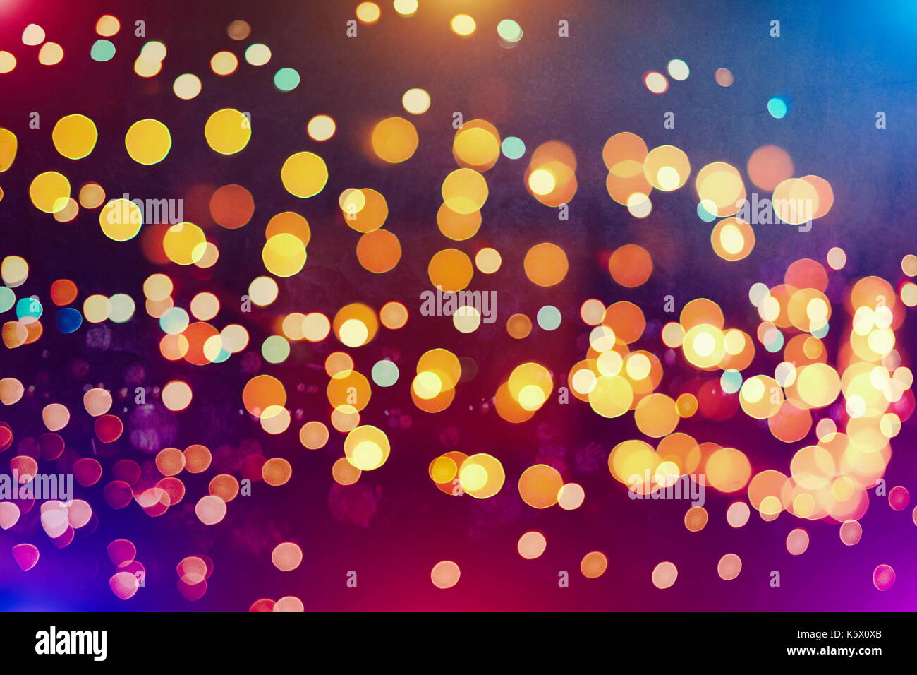 Festive background with natural bokeh and bright golden lights. Vintage ...