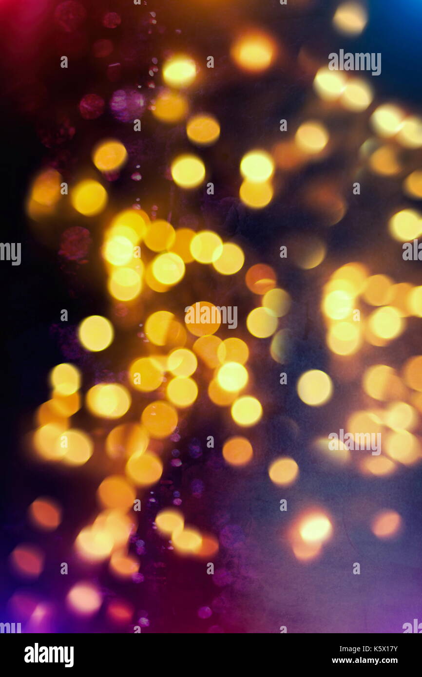 Festive background with natural bokeh and bright golden lights. Vintage ...