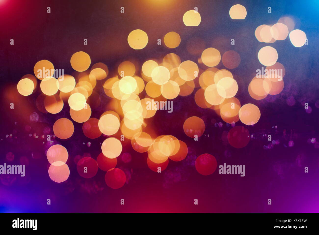 Festive background with natural bokeh and bright golden lights. Vintage ...
