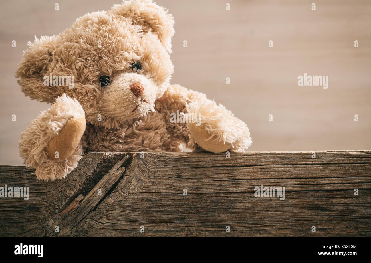 Teddy bear on wooden background, copy space Stock Photo - Alamy