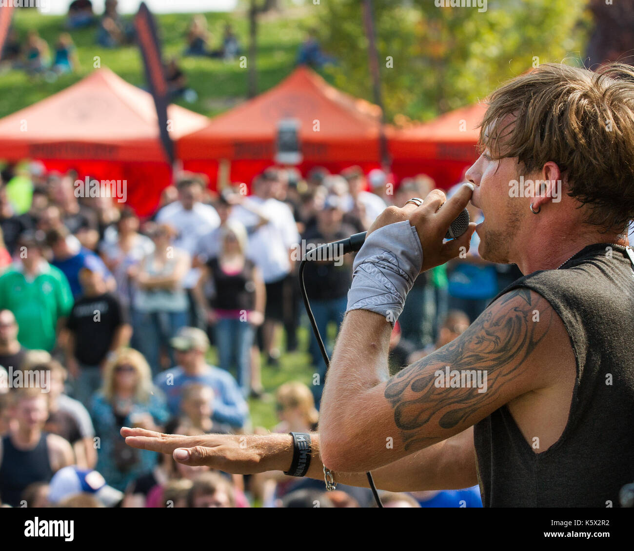 Rob Ulrich on stage performing for his fans Stock Photo
