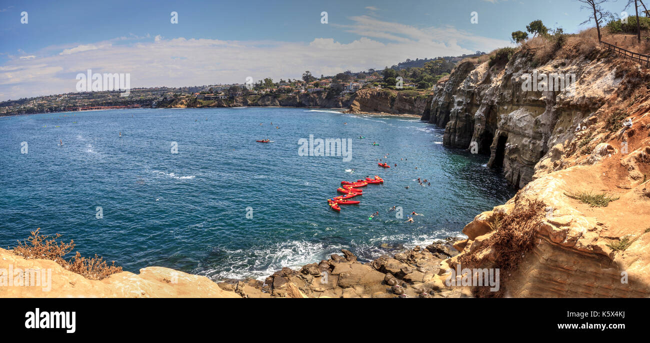 Kayaks near coastal caves at La Jolla Cove in Southern California in summer on a sunny day Stock Photo