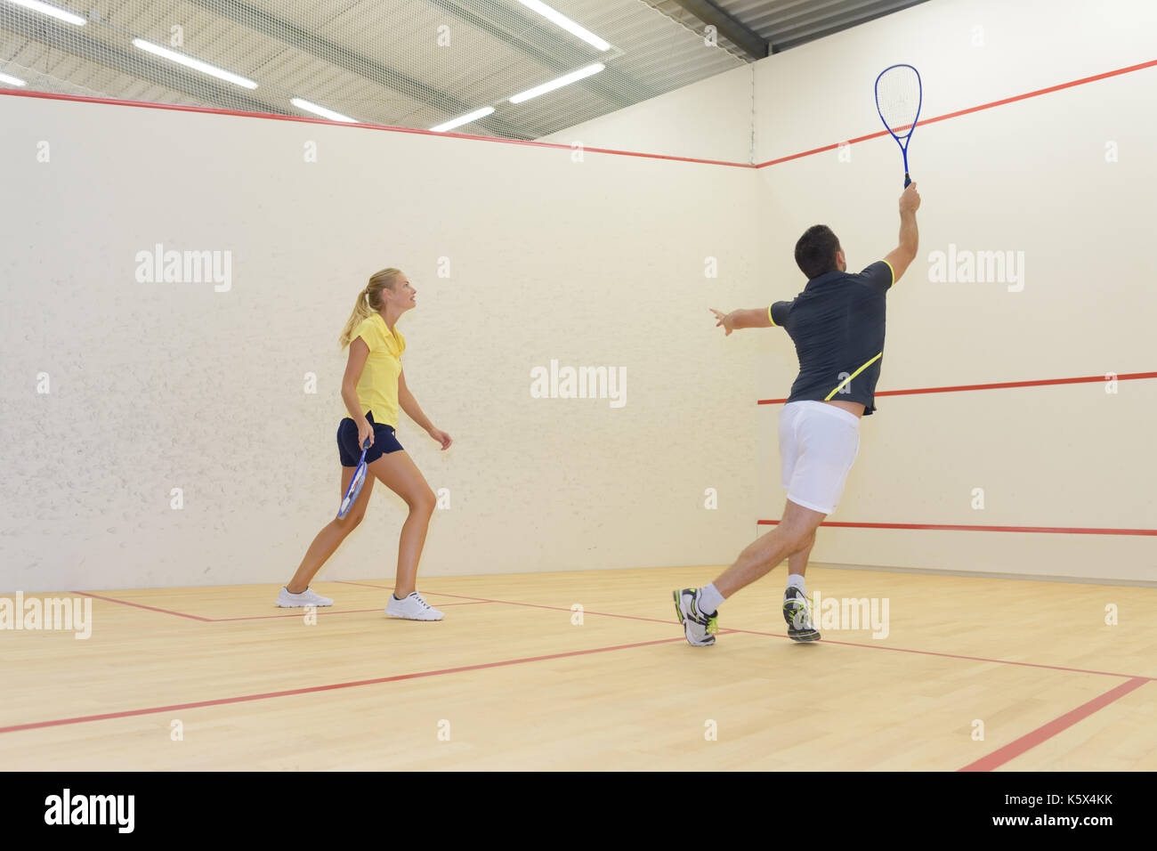 Playing indoor tennis hires stock photography and images Alamy