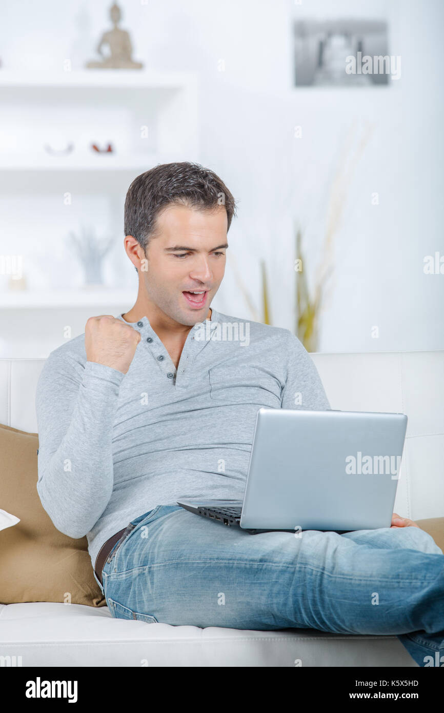 watching an intense event in the internet Stock Photo - Alamy