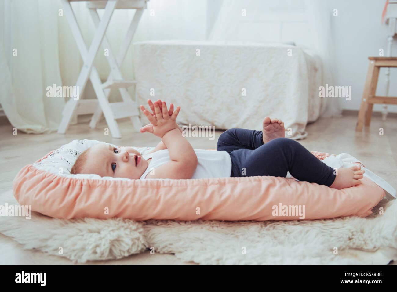 Bedding for children. The baby sleeps in bed. A healthy little baby