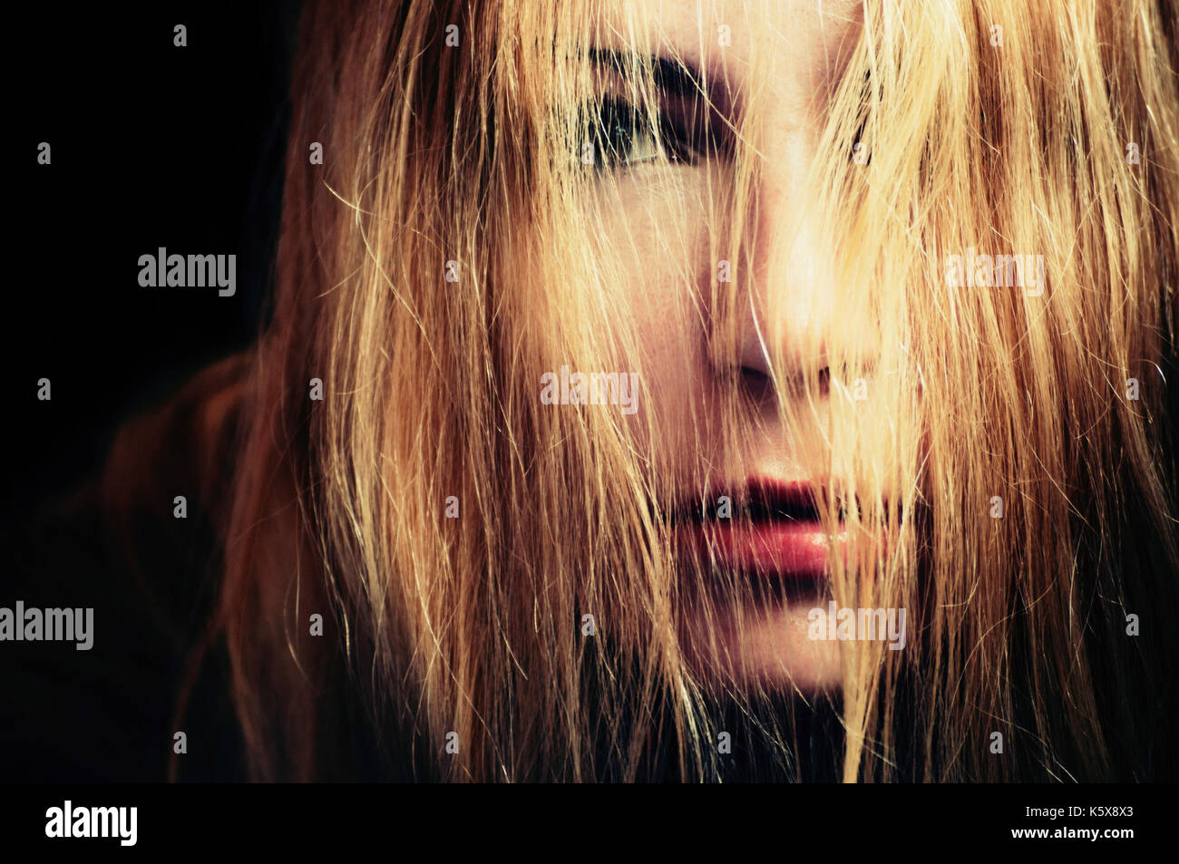 Serious blond girl hi-res stock photography and images - Alamy