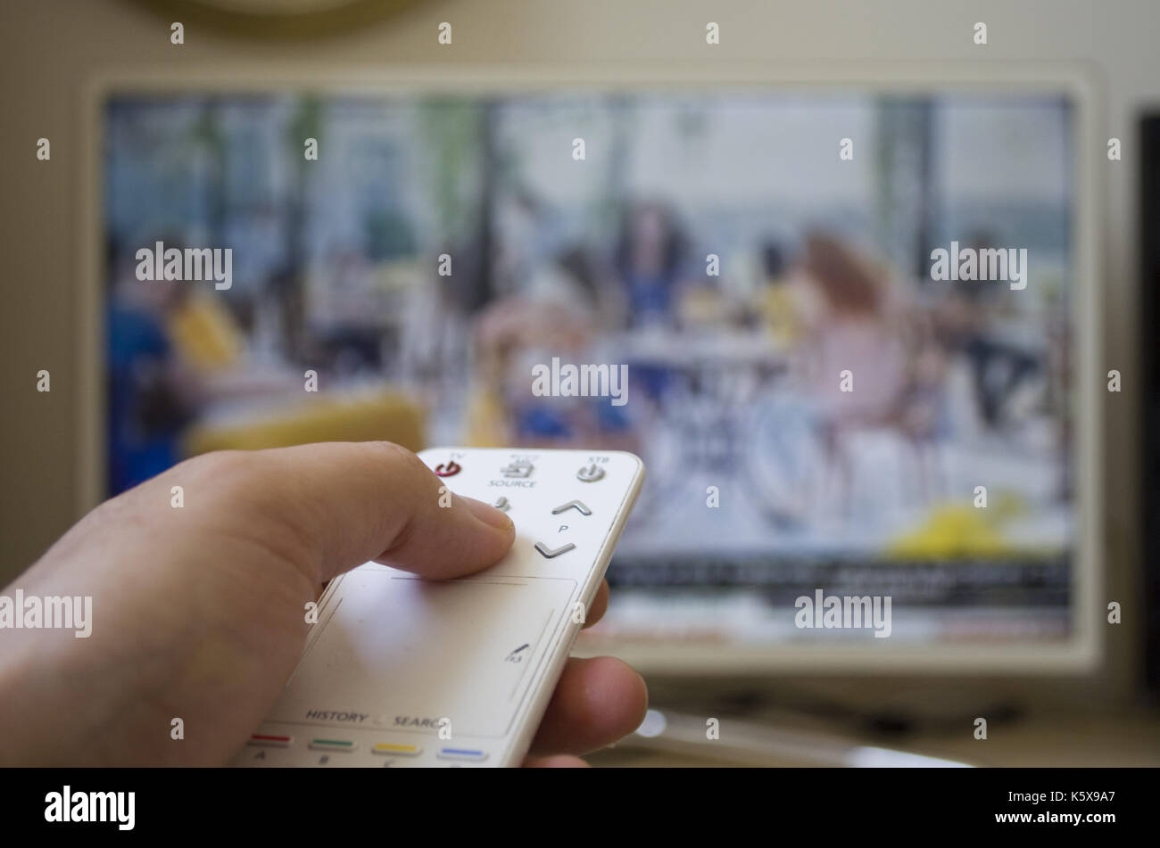 Led tv with remote hi-res stock photography and images - Alamy