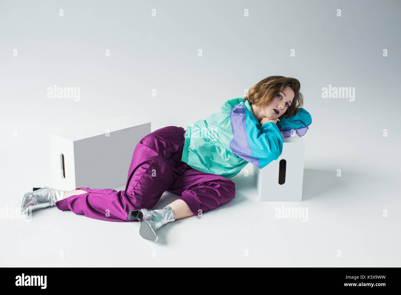 girl in sport suit and high heels Stock Photo Alamy