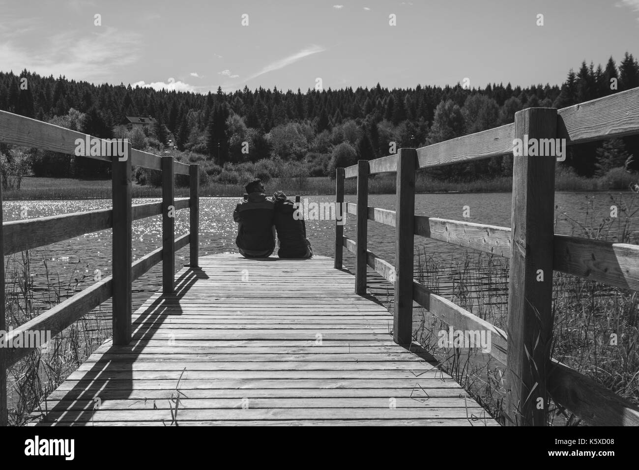 Silhouette two people walking Black and White Stock Photos & Images - Alamy