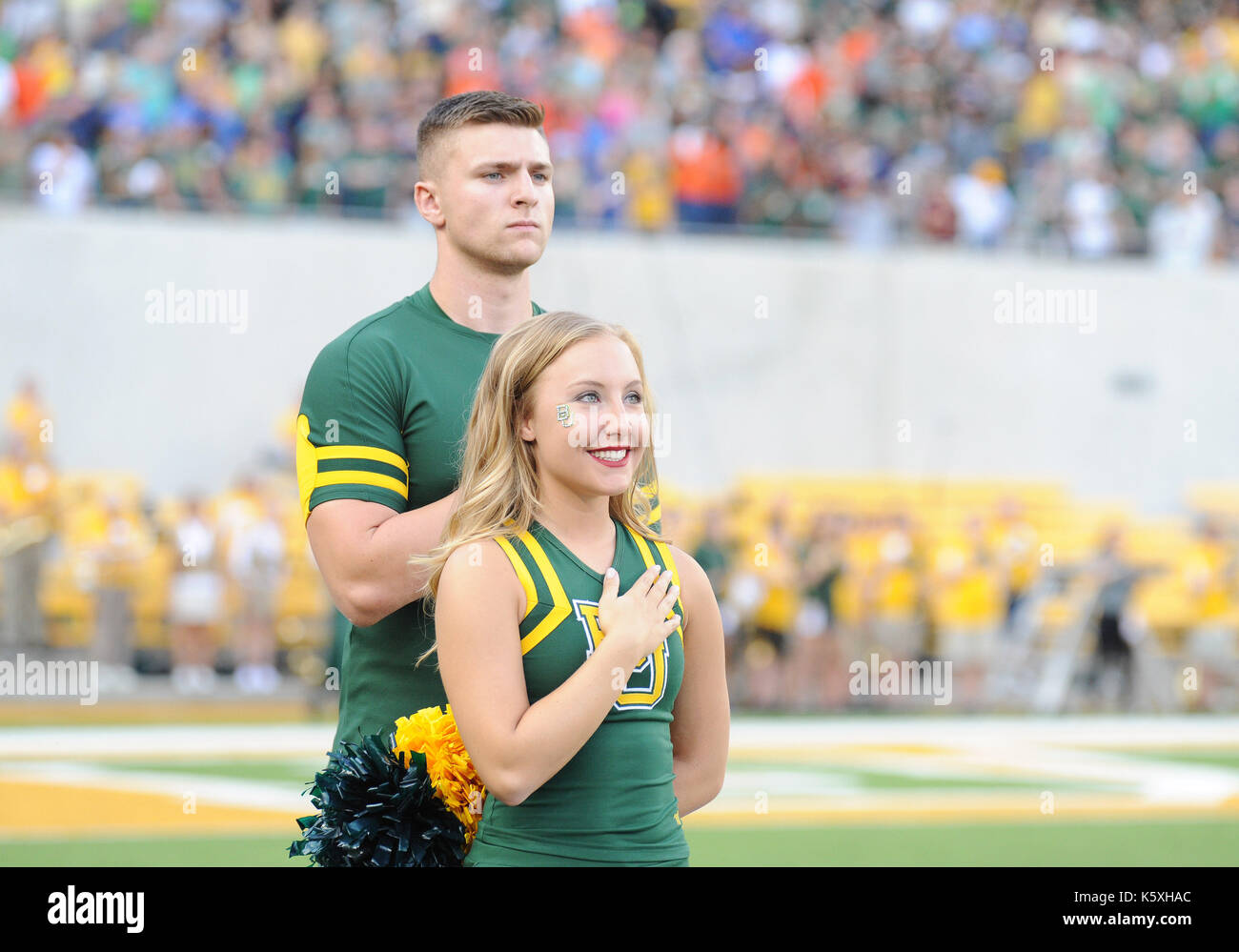 September 9, 2017: .Baylor Bears cheerleaders during the playing of the National Anthem during NCAA Football game between the Baylor Bears and the UTSA Roadrunners at McLane Stadium in Waco, Texas. Matthew Lynch/CSM Stock Photo