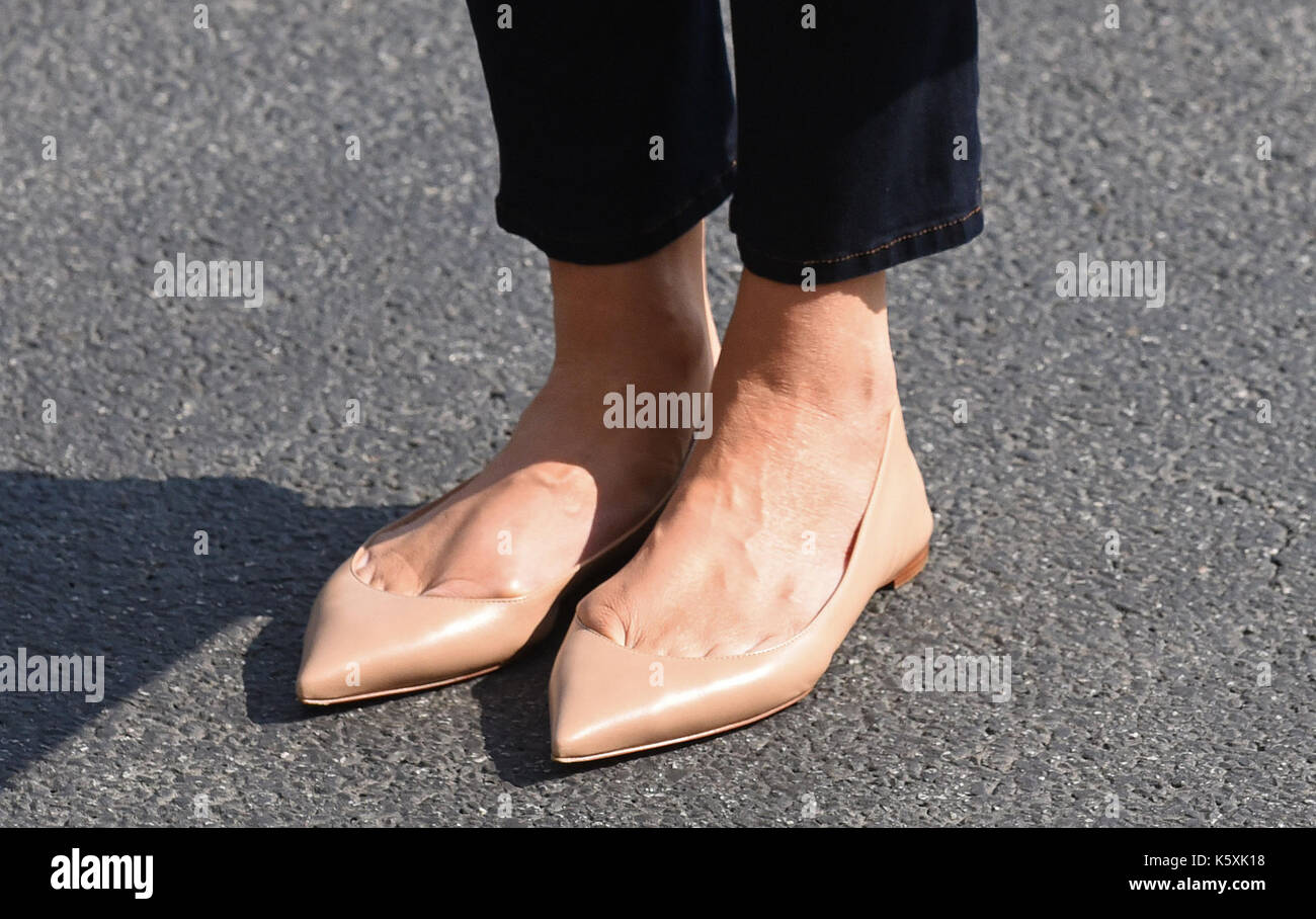Close-up of first lady Melania Trump's shoes as she walks from Marine One  upon arrival on the South Lawn of the White House in Washington, DC,  September 10, 2017, after spending the