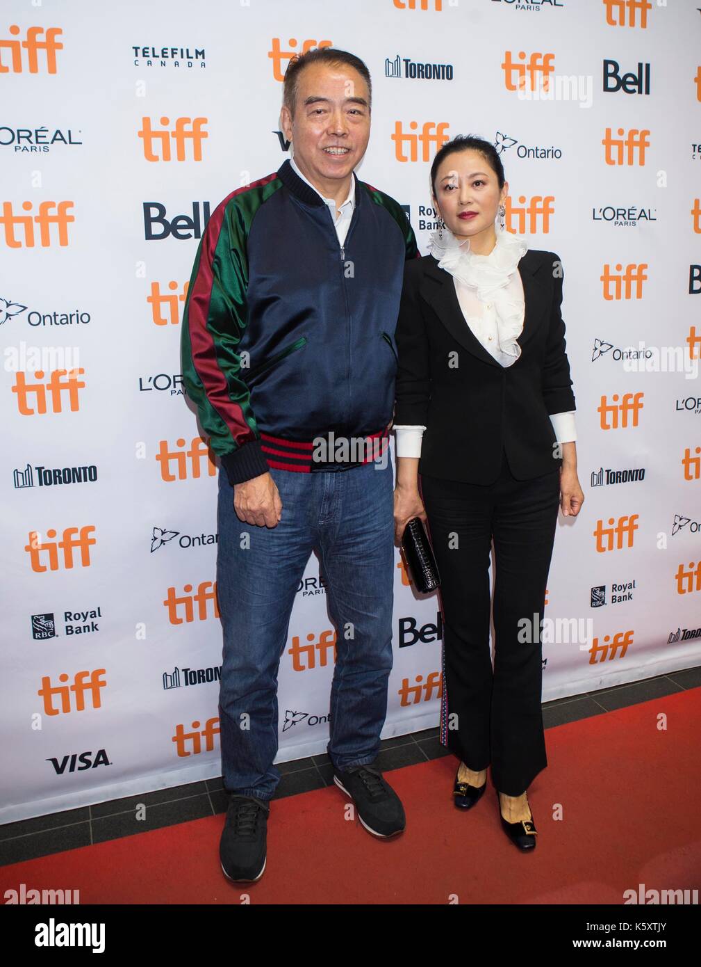 Toronto, Canada. 10th Sep, 2017. Director Chen Kaige (L) and his wife Chen Hong attend the sneak peek of his new film 'Legend of the Demon Cat' at the 2017 Toronto International Film Festival in Toronto, Canada, Sept. 10, 2017. Credit: Zou Zheng/Xinhua/Alamy Live News Stock Photo