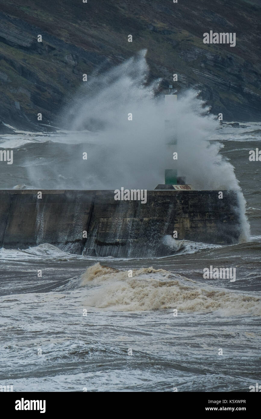Aberystwyth Wales UK, Monday 11 September 2017 UK Weather: Strong gale force winds and stormy seas batter the harbour lighthouse and seashore in Aberystwyth on the coast of Cardigan Bay in west Wales. A Met Office ‘yellow' warning has been issued for south western regions of the UK, with gusts of up to 60mph expected during the morning. photo Credit: Keith Morris/Alamy Live News Stock Photo