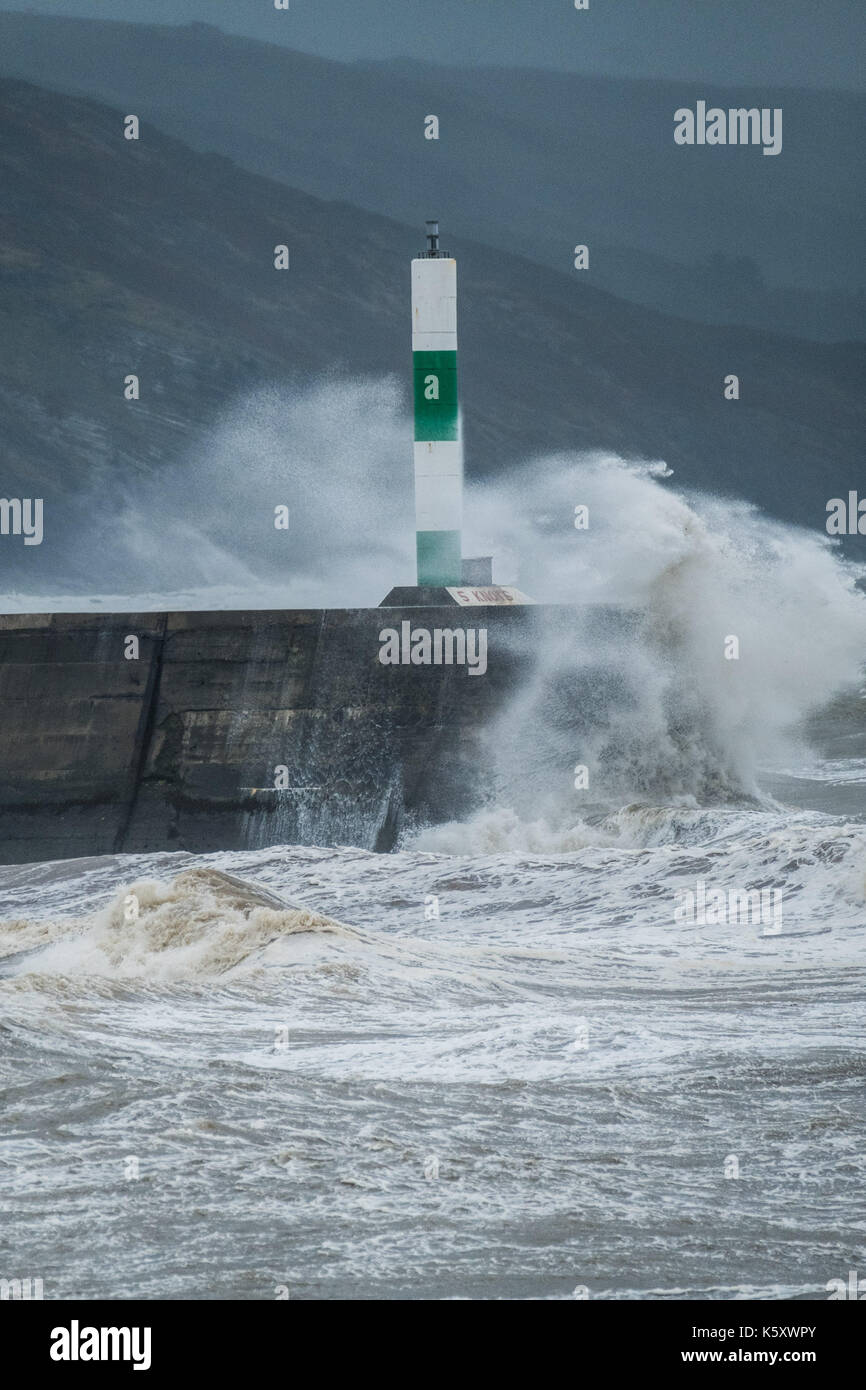 Aberystwyth Wales UK, Monday 11 September 2017 UK Weather: Strong gale force winds and stormy seas batter the harbour lighthouse and seashore in Aberystwyth on the coast of Cardigan Bay in west Wales. A Met Office ‘yellow' warning has been issued for south western regions of the UK, with gusts of up to 60mph expected during the morning. photo Credit: Keith Morris/Alamy Live News Stock Photo