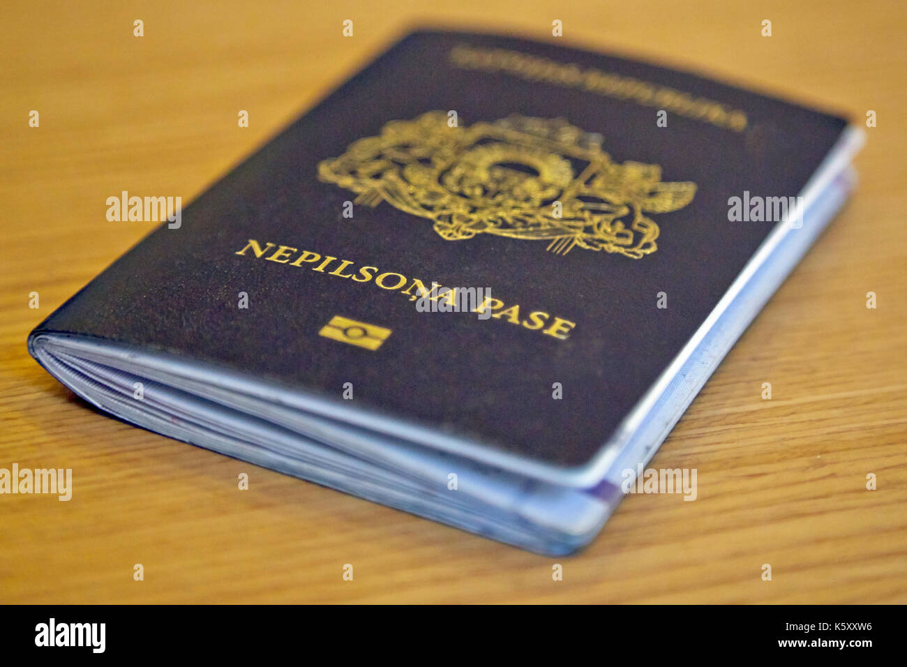 ARCHIVE - A passport for non-citizens, photograpged in Latvia, 8 November 2016. There are some 242,000 non-citizens in Latvia according to the country's interior ministry. That makes up 11 percent of the 2 million inhabitants. They are mostly comprised of citizens of the former soviet union that stayed in Latvia after the collapse in 1991, as well as their progeny. They are granted a permanent residency, but enjoy less rights in comparison to actual citizens of the country. Photo: Alexander Welscher/dpa Stock Photo