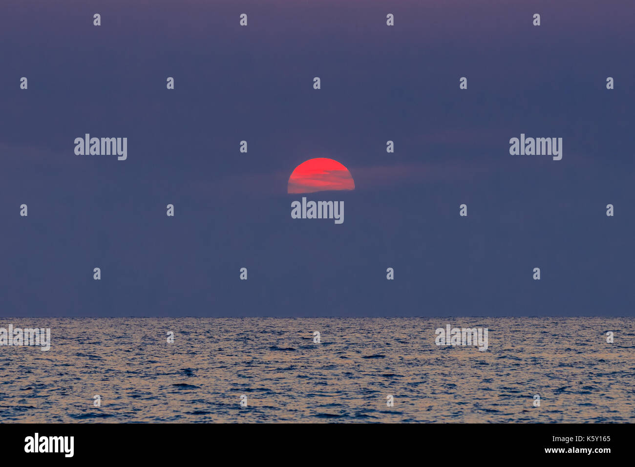 beautiful sunset at sea. Ionic Sea, Greece Stock Photo