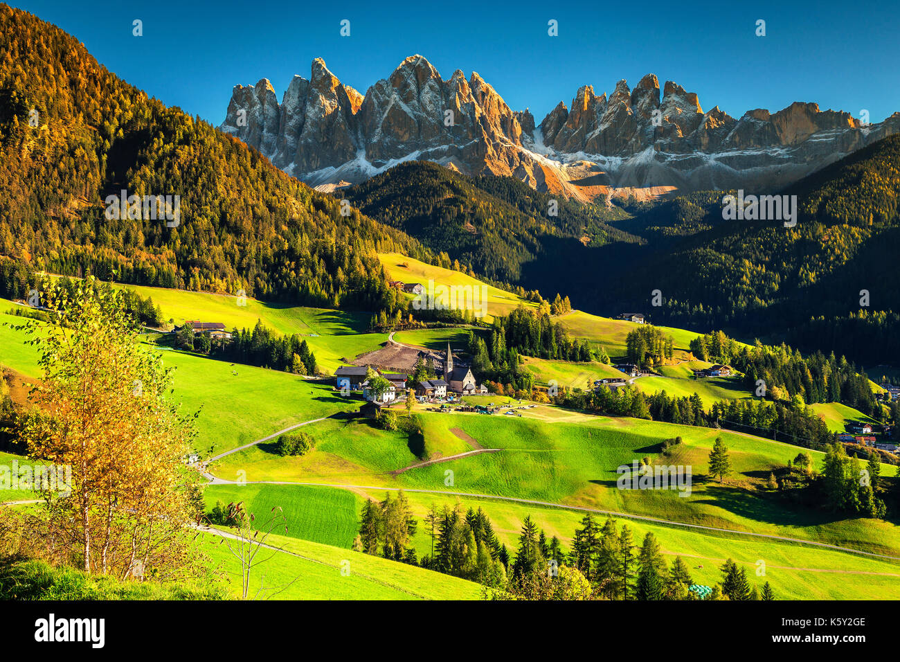 Fabulous best alpine place of the world, Santa Maddalena village with magical Dolomites mountains in background, Val di Funes valley, Trentino Alto Ad Stock Photo