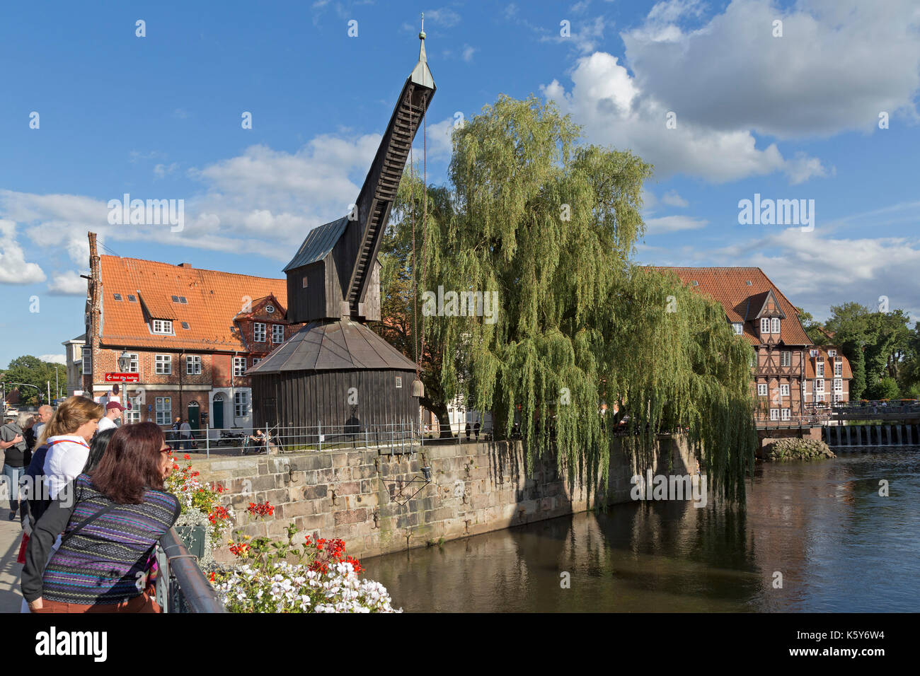 Old Harbour with treadwheel crane and restaurant Luener Muehle, Lueneburg, Lower Saxony, Germany Stock Photo