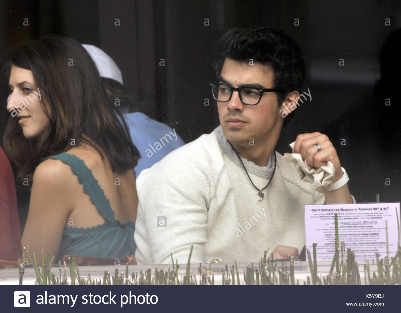 Joe Jonas Of The Popular Jonas Bros Singing Group Has Lunch At The Newsroom Cafe With A Friend In Beverly Hills Ca Joe Jonas Of The Popular Jonas Bros Singing Group Has Lunch At The Newsroom Cafe With A Friend In Beverly Hills Ca