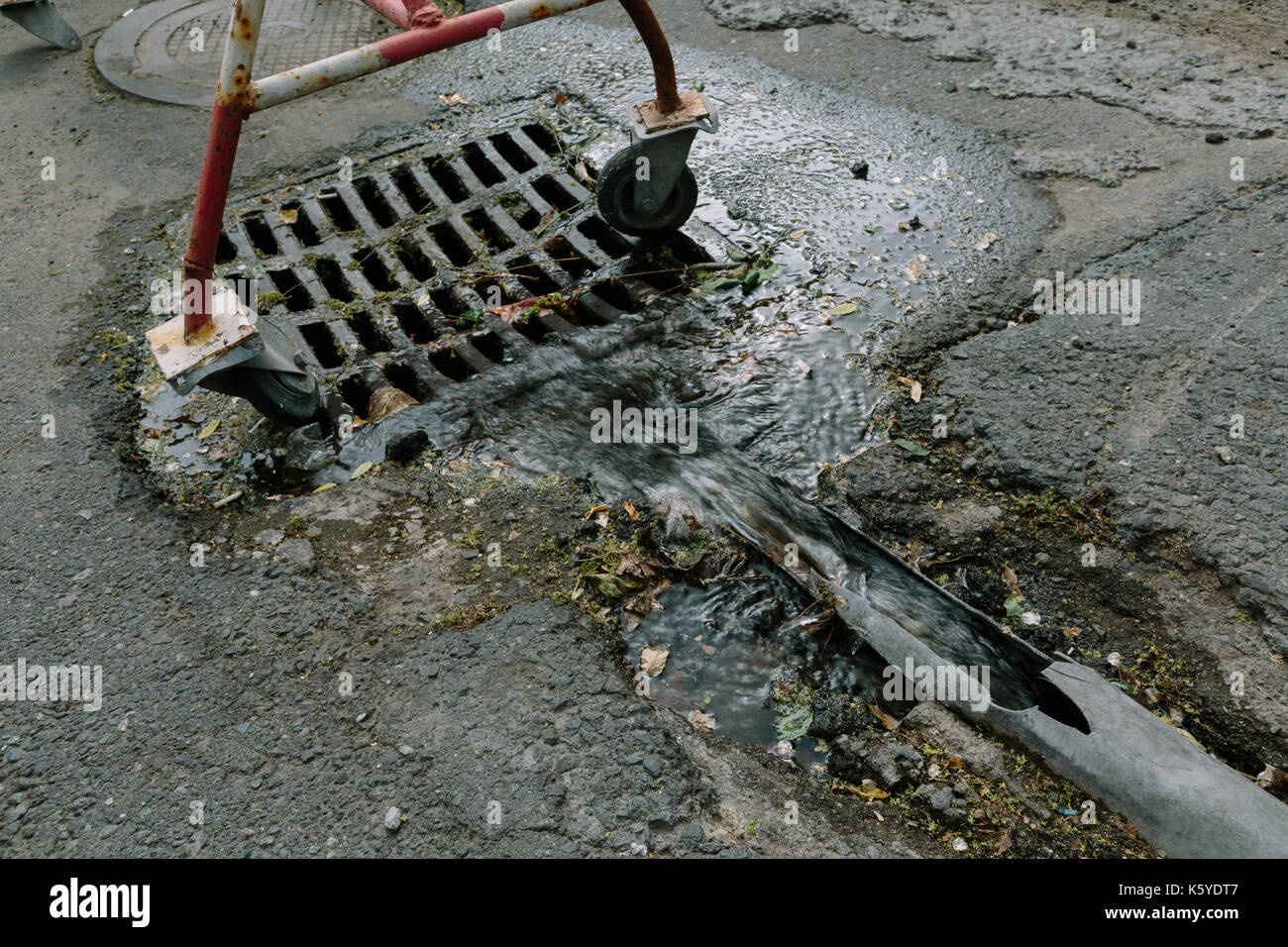 Drain the water into the sewer Stock Photo Alamy