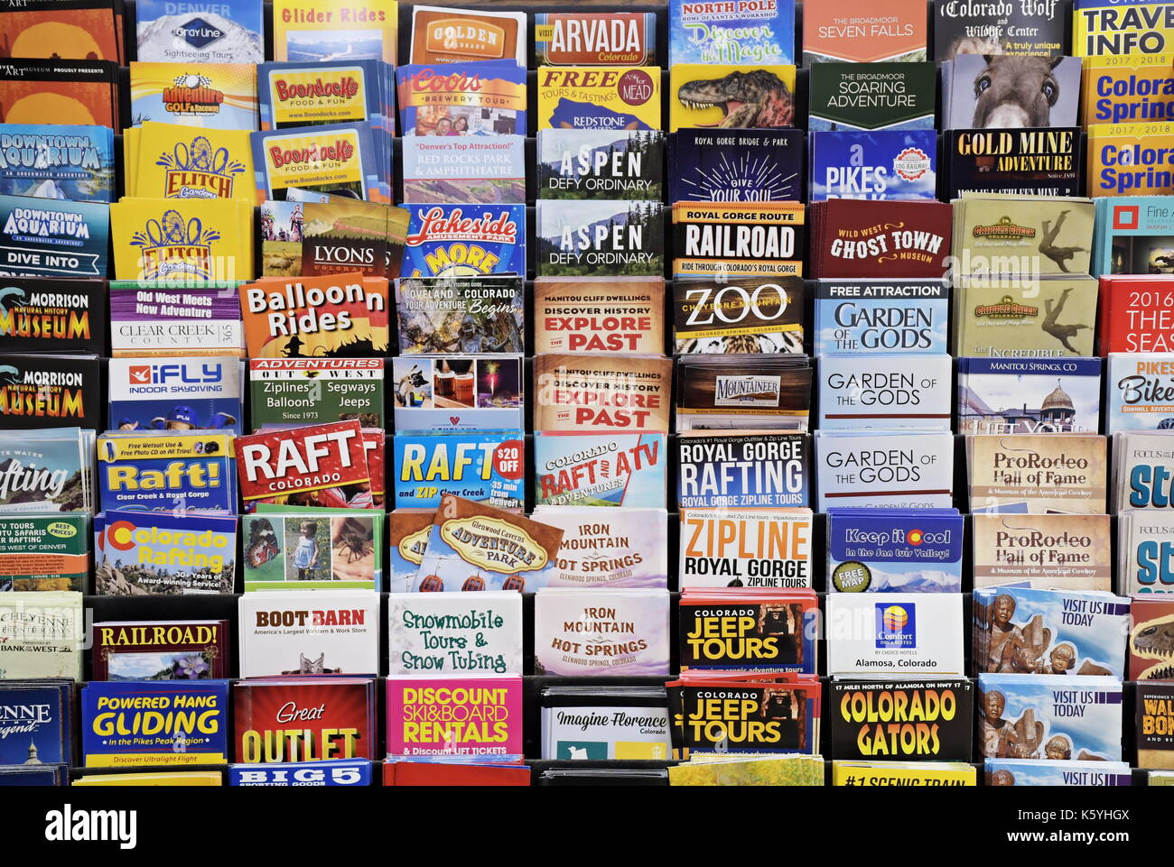 Colorful Colorado Tourist Brochures arranged on a rack Stock Photo