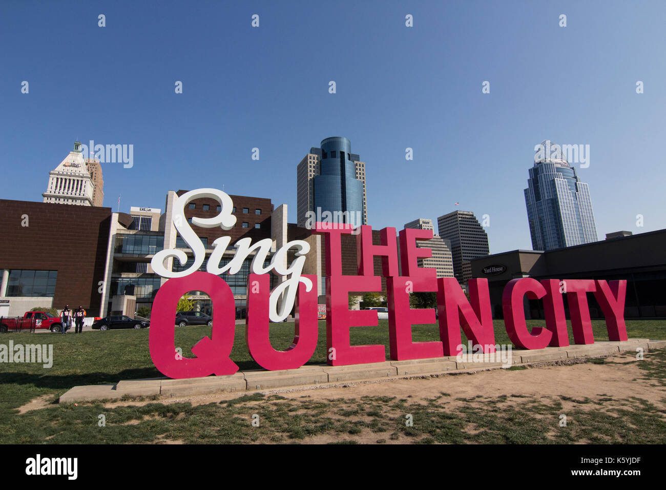 Sign located in Cincinnati, Ohio reading Sing the Queen City. Stock Photo