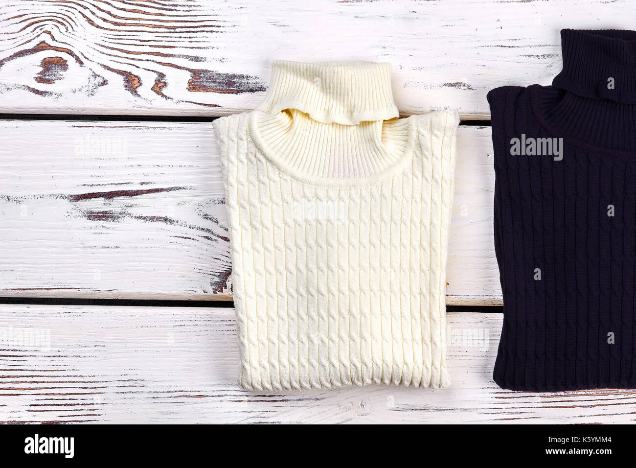 how to fold thick sweaters