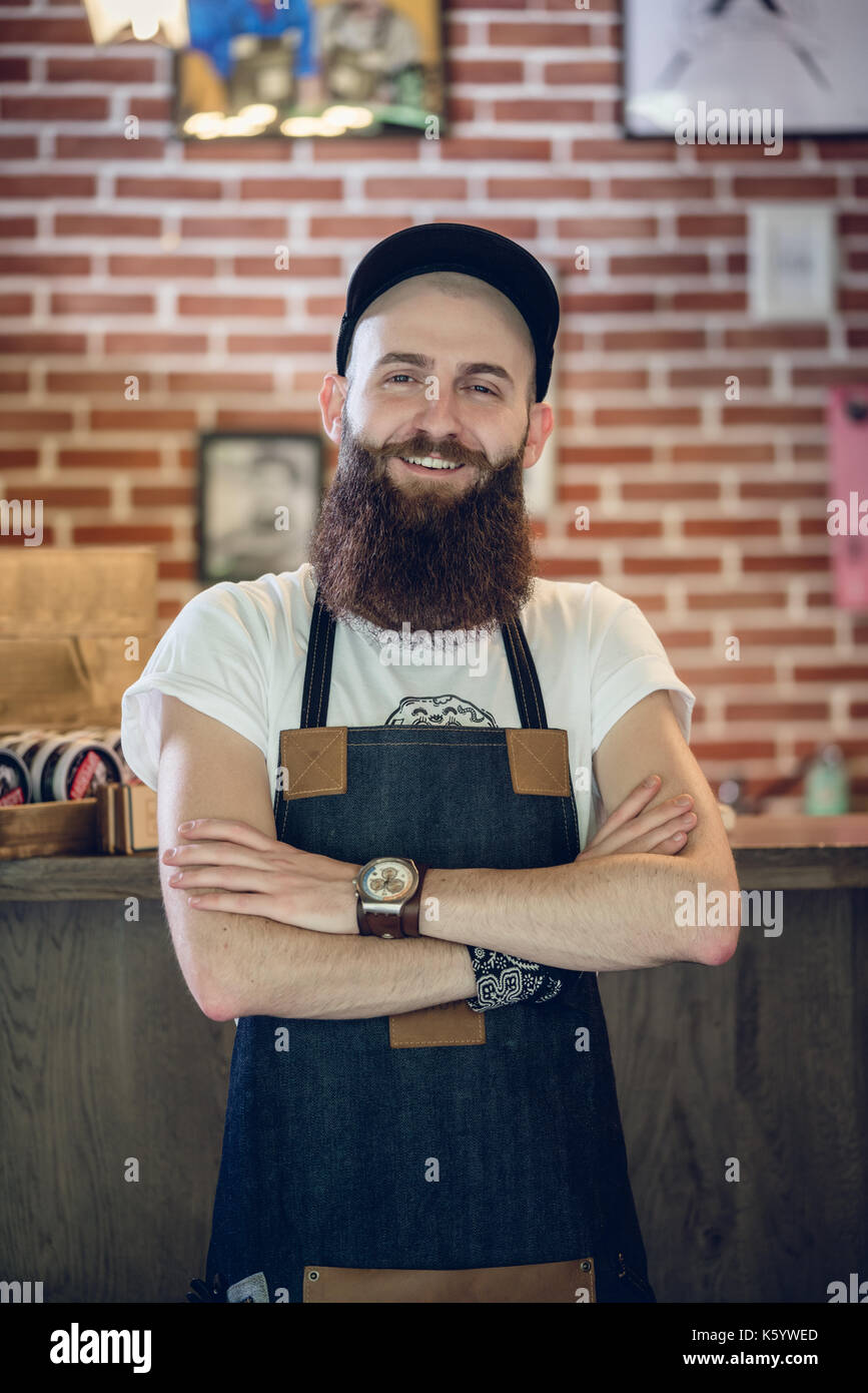 Portrait of a cool hairstylist looking at camera with confidence Stock Photo