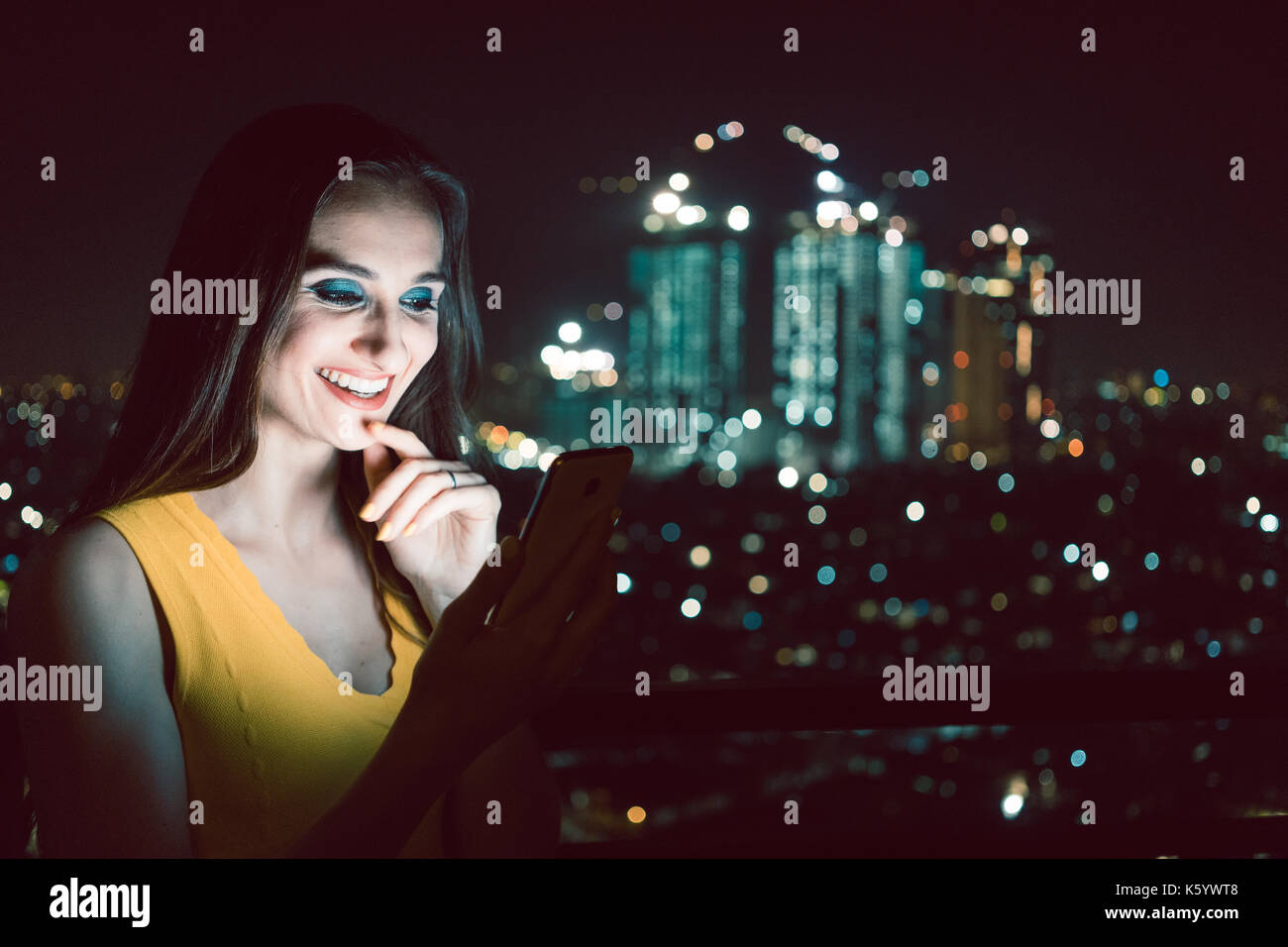 Woman using dating app on social media phone Stock Photo