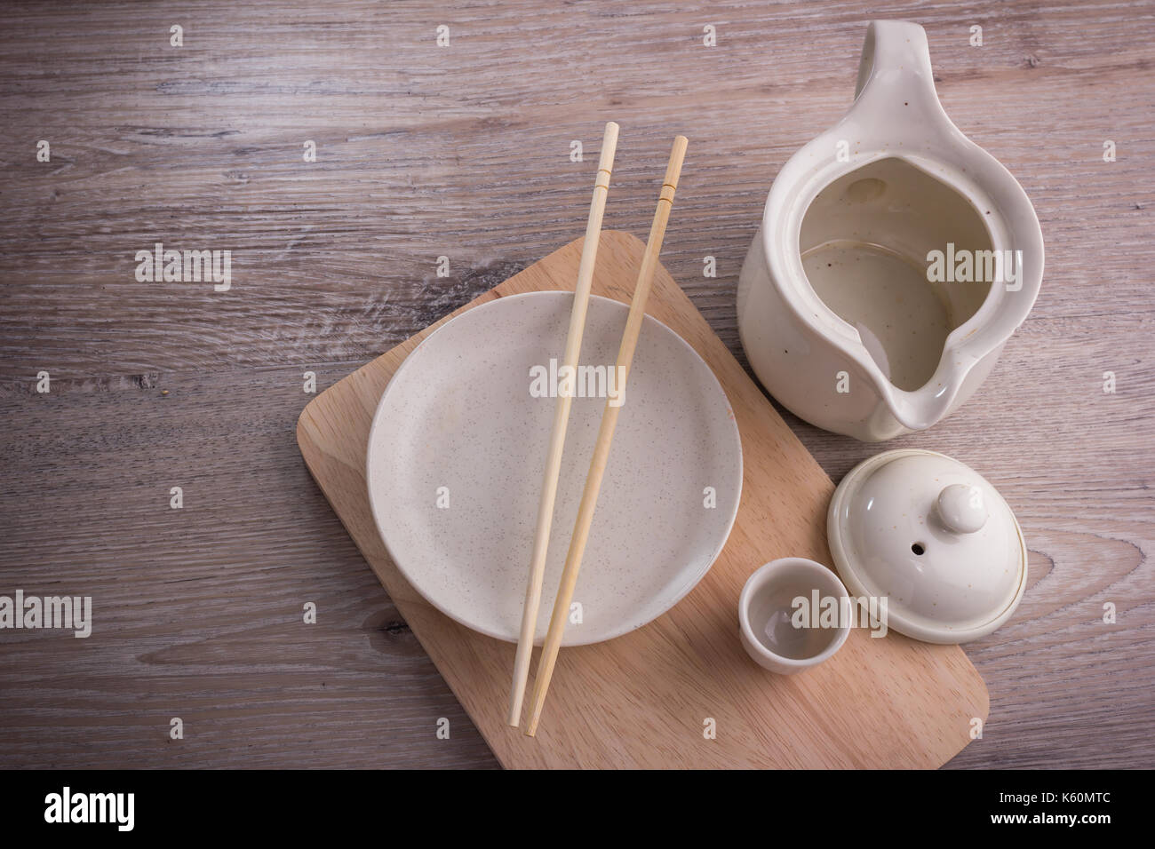 empty tea drinking set on old wood texture background Stock Photo - Alamy